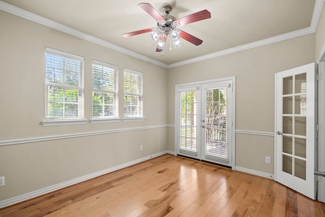 155 Pronghorn Pl, Montgomery, TX 77316 - unfurnished room featuring light wood-type flooring, crown molding, french doors, and a ceiling fan