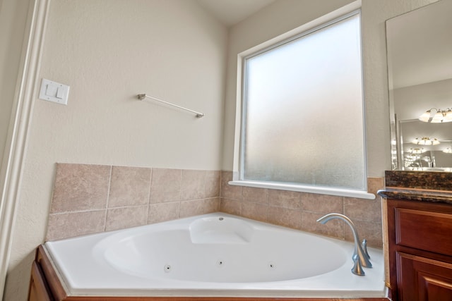 155 Pronghorn Pl, Montgomery, TX 77316 - bathroom featuring a jetted tub and vanity