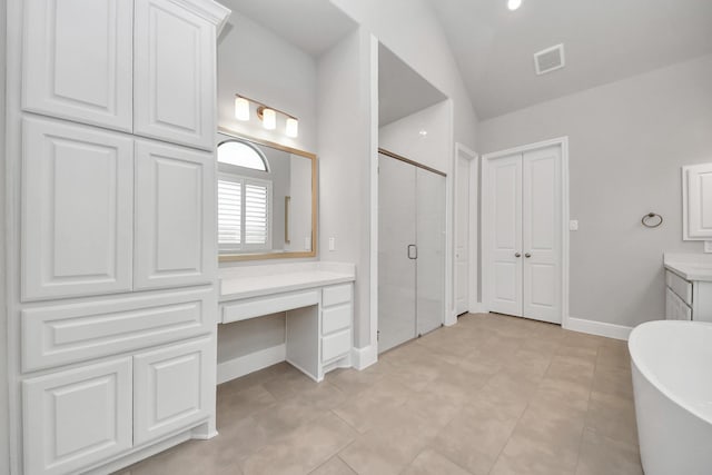 full bath featuring a stall shower, vanity, a soaking tub, baseboards, and visible vents