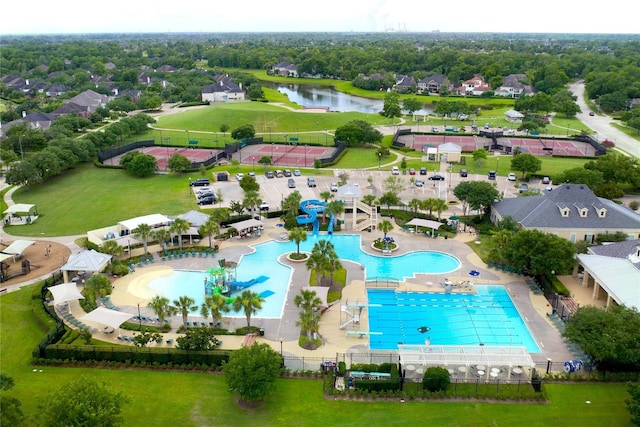 birds eye view of property featuring a water view