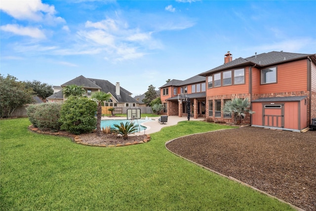 view of yard with fence, a fenced in pool, central AC unit, and a patio area