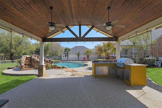 17310 Calico Peak Way, Cypress, TX 77433 - fenced backyard with a ceiling fan and a patio area