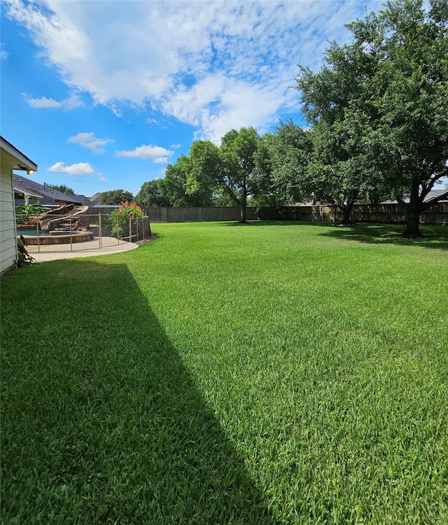 17310 Calico Peak Way, Cypress, TX 77433 - view of yard featuring a patio
