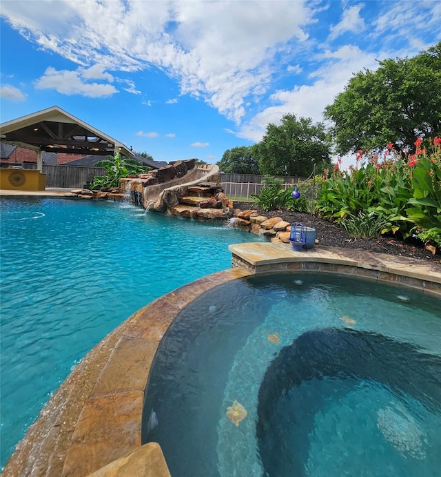 17310 Calico Peak Way, Cypress, TX 77433 - view of swimming pool with a fenced backyard, a gazebo, and a pool with connected hot tub