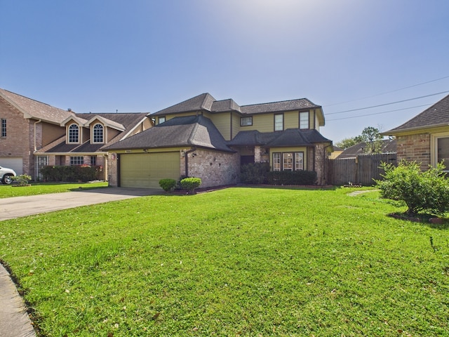 13523 Pasa Robles Ln, Houston, TX 77083 - view of front of home with fence, a garage, brick siding, a front lawn, and driveway