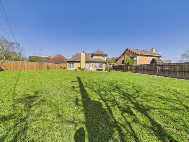 13523 Pasa Robles Ln, Houston, TX 77083 - view of yard featuring a fenced backyard