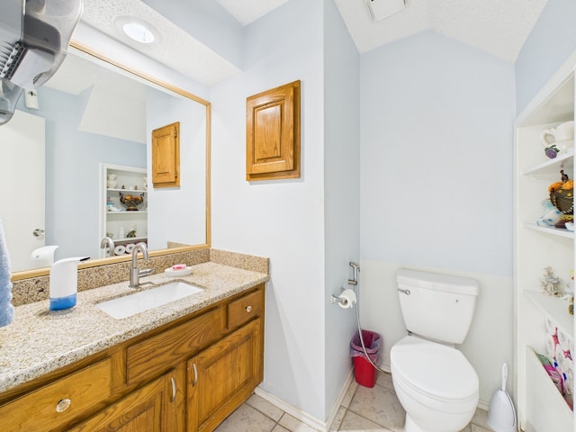 13523 Pasa Robles Ln, Houston, TX 77083 - bathroom featuring tile patterned floors, toilet, vanity, baseboards, and visible vents