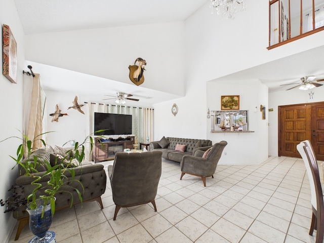 13523 Pasa Robles Ln, Houston, TX 77083 - living area featuring light tile patterned flooring, ceiling fan with notable chandelier, and high vaulted ceiling