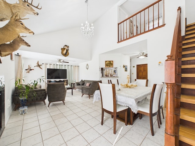 13523 Pasa Robles Ln, Houston, TX 77083 - dining space with light tile patterned flooring, ceiling fan with notable chandelier, lofted ceiling, and stairway