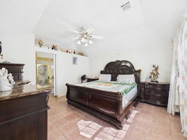 13523 Pasa Robles Ln, Houston, TX 77083 - bedroom with light tile patterned flooring, a textured ceiling, visible vents, and vaulted ceiling
