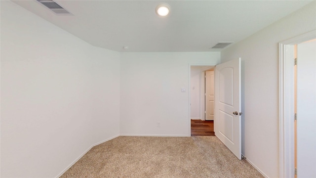 24327 Copperleaf Bay Ln, Spring, TX 77373 - empty room featuring light carpet and baseboards
