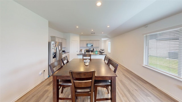 24327 Copperleaf Bay Ln, Spring, TX 77373 - dining space featuring light wood-style flooring, recessed lighting, and baseboards