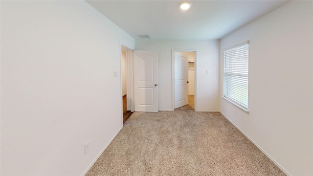24327 Copperleaf Bay Ln, Spring, TX 77373 - unfurnished bedroom featuring carpet floors and baseboards