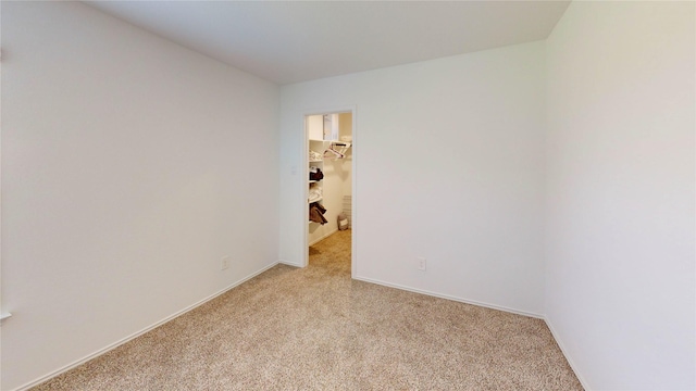 24327 Copperleaf Bay Ln, Spring, TX 77373 - spare room with light carpet and baseboards