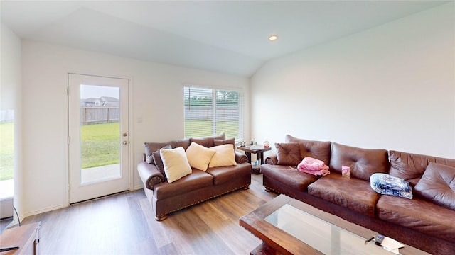 24327 Copperleaf Bay Ln, Spring, TX 77373 - living room featuring light wood-type flooring, vaulted ceiling, and recessed lighting