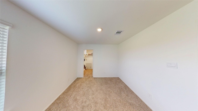 24327 Copperleaf Bay Ln, Spring, TX 77373 - empty room featuring light colored carpet, recessed lighting, and baseboards