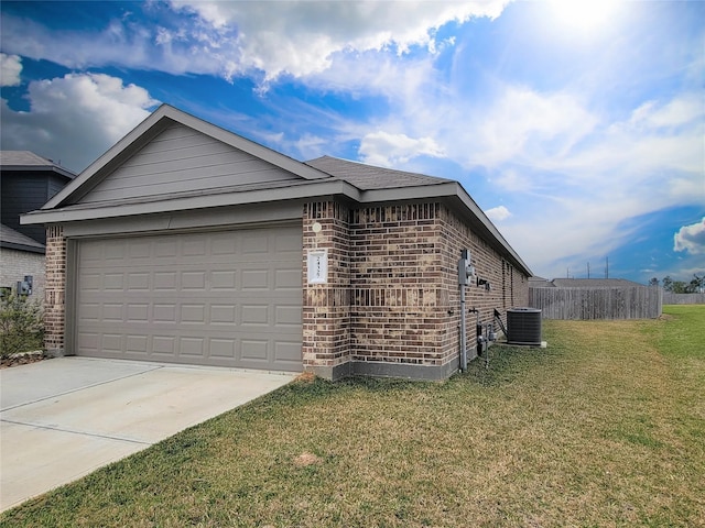 24327 Copperleaf Bay Ln, Spring, TX 77373 - view of side of home with brick siding, central AC, driveway, and an attached garage