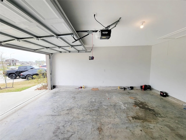 24327 Copperleaf Bay Ln, Spring, TX 77373 - garage featuring a garage door opener