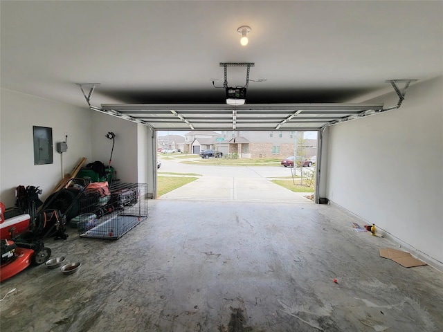 24327 Copperleaf Bay Ln, Spring, TX 77373 - garage with electric panel and a garage door opener