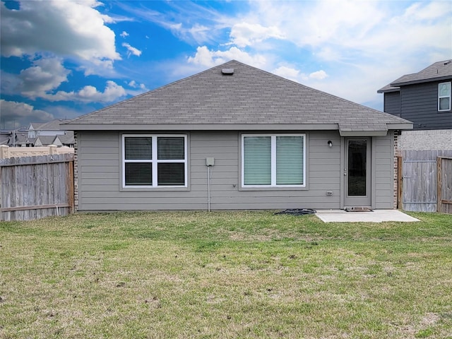24327 Copperleaf Bay Ln, Spring, TX 77373 - rear view of house with a shingled roof and a patio area