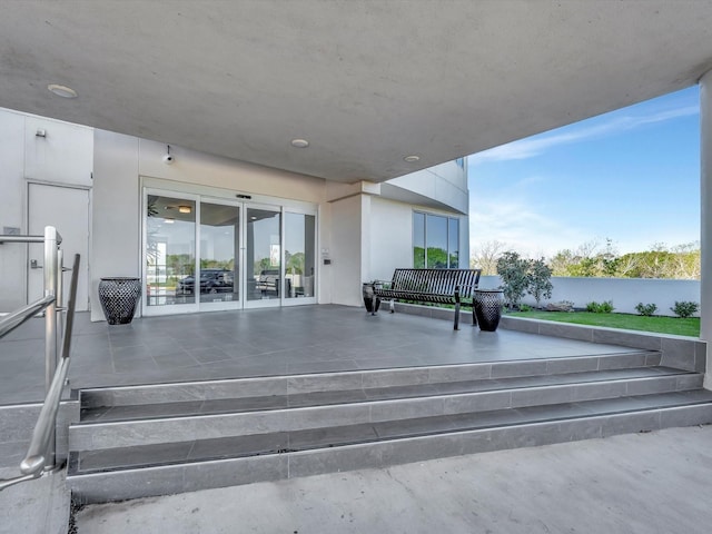view of patio with a water view