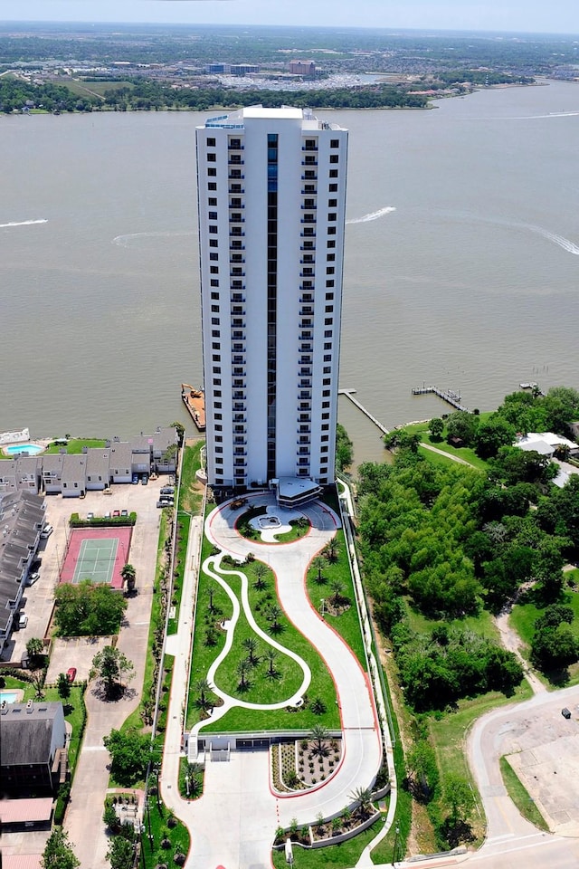 birds eye view of property featuring a water view