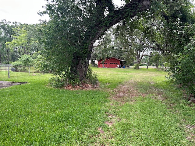 325 Hargett St, Clute, TX 77531 - view of yard with a garage