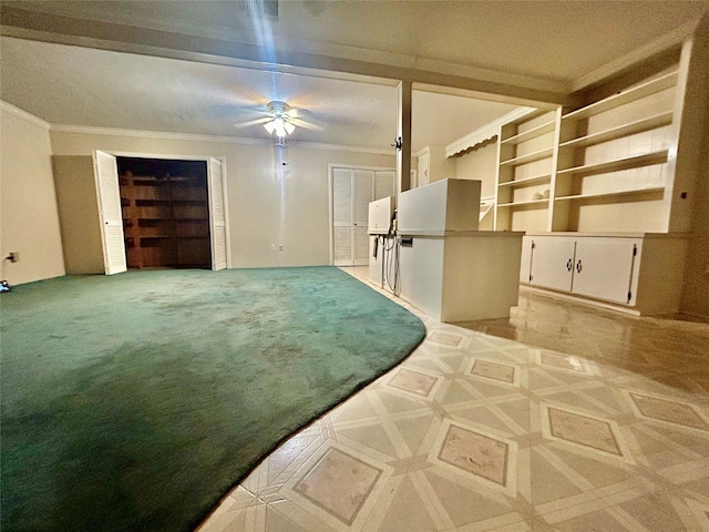 325 Hargett St, Clute, TX 77531 - unfurnished living room with ornamental molding, a ceiling fan, and light colored carpet