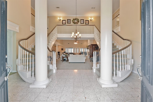 2536 22nd Ave N, Texas City, TX 77590 - foyer entrance featuring visible vents, a high ceiling, an inviting chandelier, and stairway