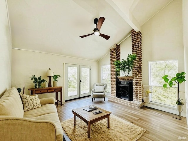 8522 Pearl Lake Dr, Houston, TX 77095 - living area featuring a ceiling fan, wood finished floors, beamed ceiling, high vaulted ceiling, and a fireplace