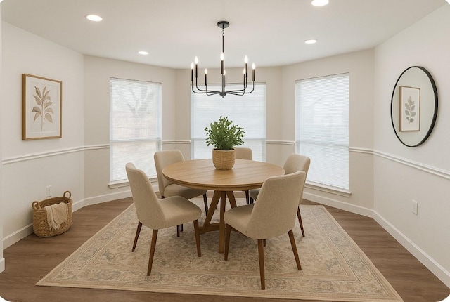 8522 Pearl Lake Dr, Houston, TX 77095 - dining space with a chandelier, baseboards, dark wood-style flooring, and recessed lighting