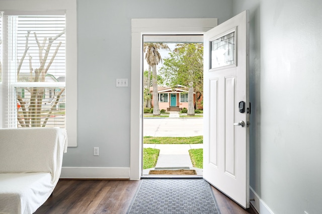 3529 Avenue S, Galveston, TX 77550 - entrance foyer with plenty of natural light, baseboards, and wood finished floors
