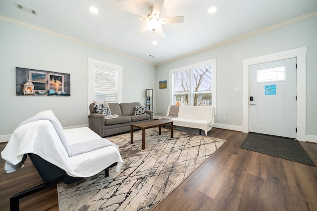 3529 Avenue S, Galveston, TX 77550 - living room featuring baseboards, ornamental molding, visible vents, and dark wood finished floors