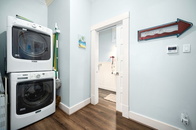 3529 Avenue S, Galveston, TX 77550 - laundry room with stacked washer and clothes dryer, baseboards, laundry area, and dark wood finished floors
