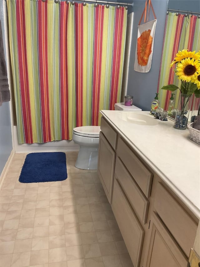 18146 River Sage Dr, Houston, TX 77084 - bathroom featuring vanity, toilet, and shower / tub combo with curtain