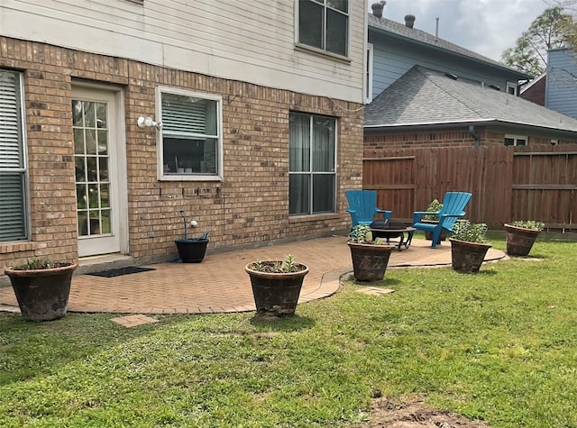 18146 River Sage Dr, Houston, TX 77084 - back of house featuring a patio area and brick siding
