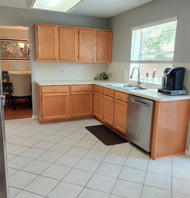 18146 River Sage Dr, Houston, TX 77084 - kitchen with dishwasher, a sink, light countertops, and a chandelier