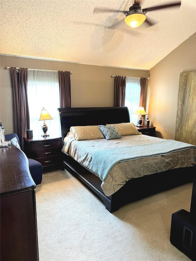18146 River Sage Dr, Houston, TX 77084 - bedroom featuring light carpet, a textured ceiling, and a ceiling fan