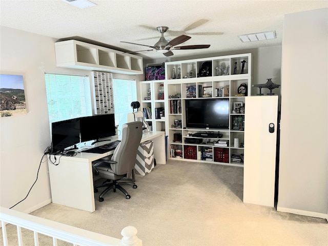 18146 River Sage Dr, Houston, TX 77084 - office area with carpet floors, a ceiling fan, and a textured ceiling