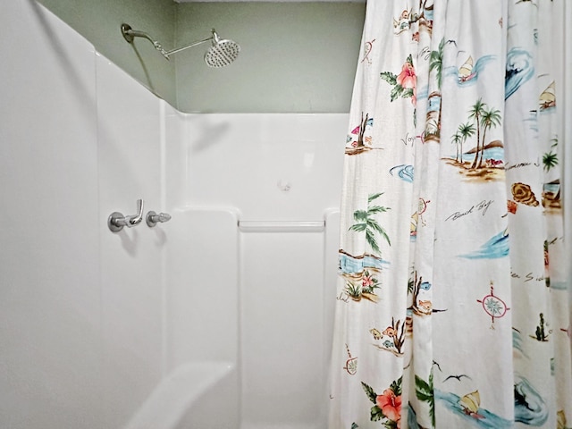 bathroom with curtained shower