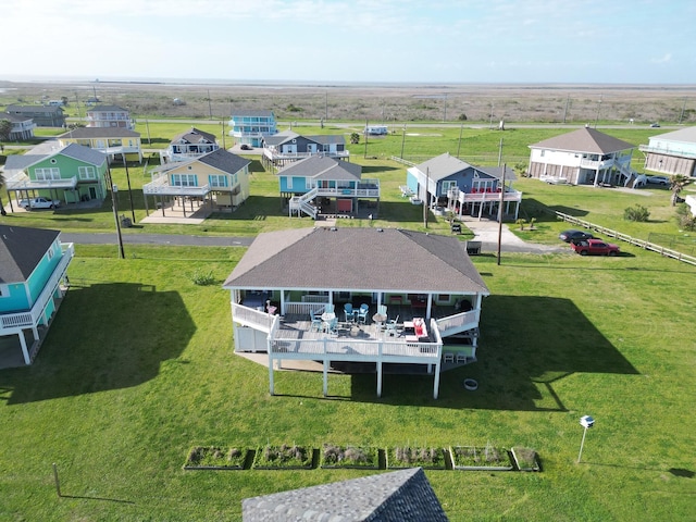 birds eye view of property with a residential view