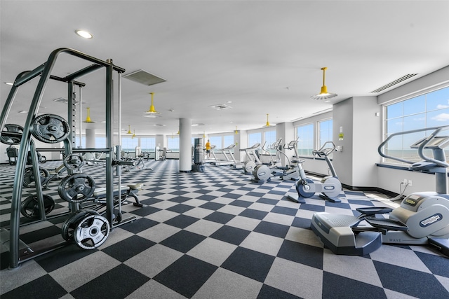 workout area with baseboards and visible vents
