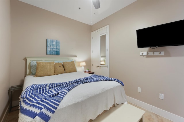 bedroom with baseboards and ceiling fan