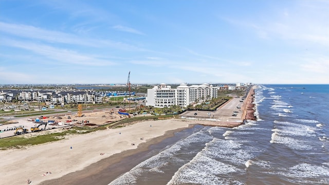 bird's eye view featuring a beach view, a water view, and a city view