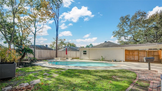 view of pool featuring a fenced in pool, a fenced backyard, central AC, a patio, and a lawn