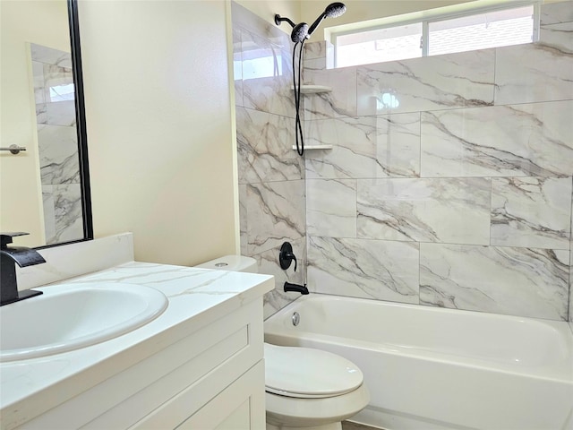 full bath featuring toilet, vanity, and shower / washtub combination