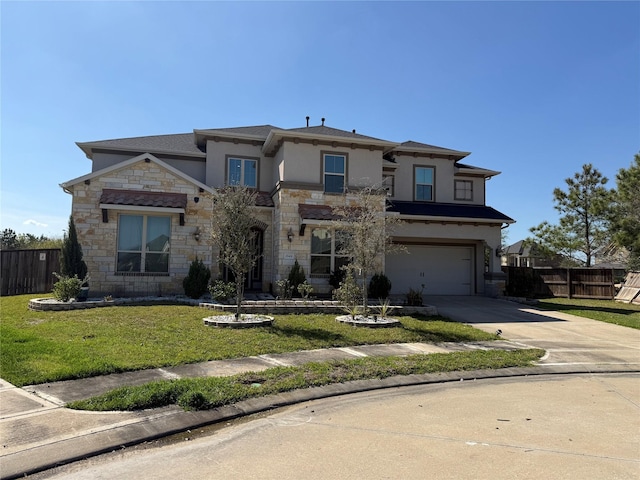 29431 Amber Meadows Ct, Katy, TX 77494 - prairie-style home featuring stone siding, driveway, fence, an attached garage, and stucco siding