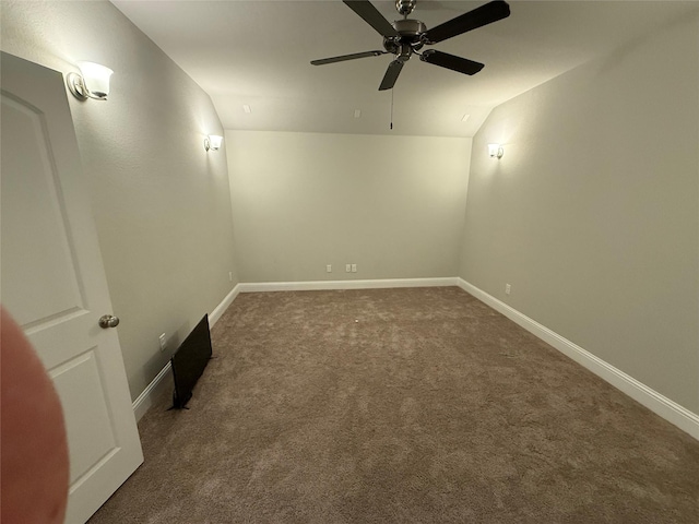 29431 Amber Meadows Ct, Katy, TX 77494 - spare room featuring baseboards, lofted ceiling, a ceiling fan, and carpet