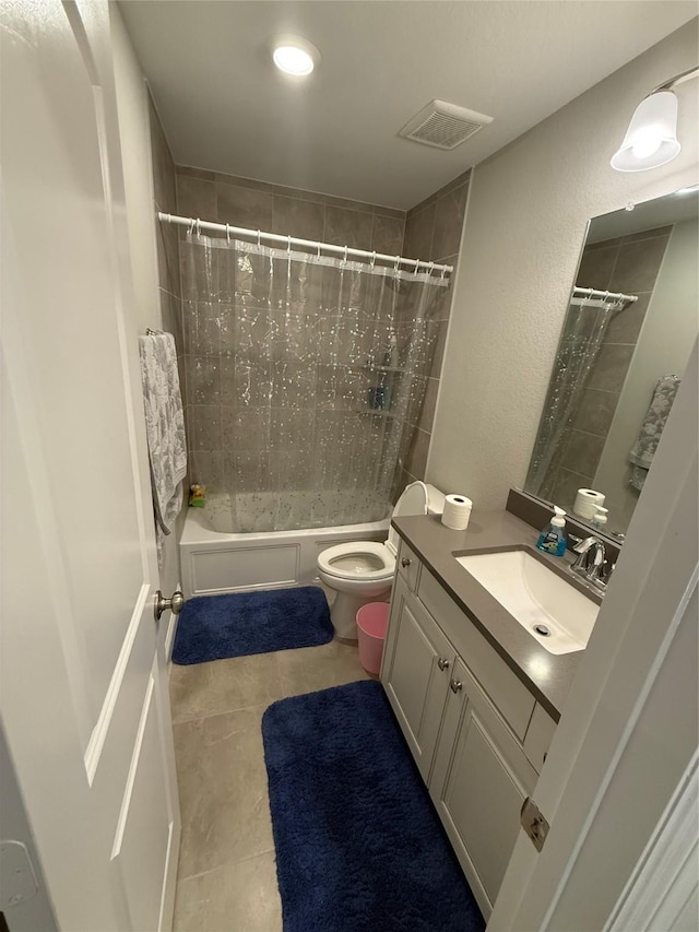 29431 Amber Meadows Ct, Katy, TX 77494 - full bath featuring visible vents, toilet, tile patterned floors, vanity, and shower / bathtub combination with curtain