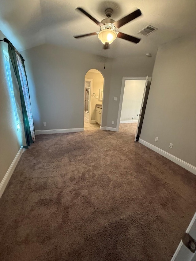 29431 Amber Meadows Ct, Katy, TX 77494 - interior space with arched walkways, baseboards, visible vents, and light carpet
